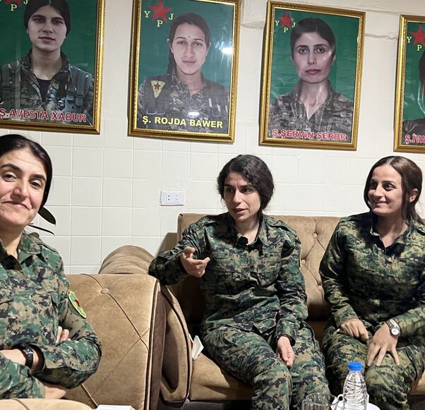 YPJ Commander in Chief Rojhelat Afrin pictured at YPJ headquarters near Al-Hasakh with YPJ spokesperson Heval Roksana and YPJ Field Commander Heval Kurdistan, Nov. 23, 204.