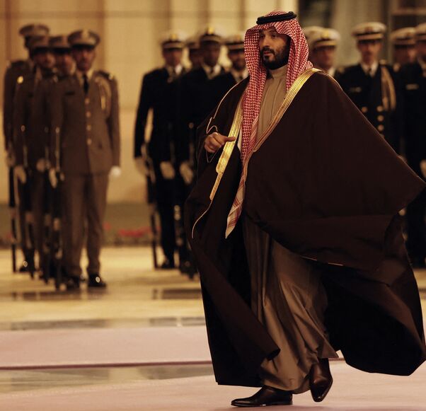 Saudi Arabia's Crown Prince Mohammed bin Salman walks to welcome France's president (not pictured) ahead of their meeting in Riyadh, on Dec. 2, 2024.