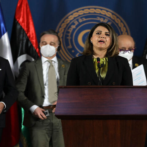 Libyan Foreign Minister Najla al-Mangoush speaks, as her counterparts (R to L) French Jean-Yves Le Drian, German Heiko Maas and Italian Luigi Di Maio listen, during a press conference, Tripoli, Libya, March 25, 2021.