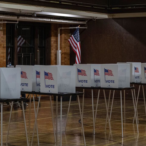 Empty voting booths are seen in Flint, Michigan at the Berston Fieldhouse polling place on Nov. 3, 2020. 