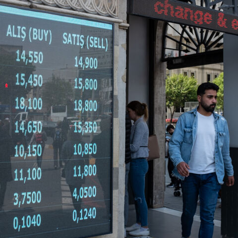 A man walks past a currency exchange office on May 05, 2022, in Istanbul, Turkey.