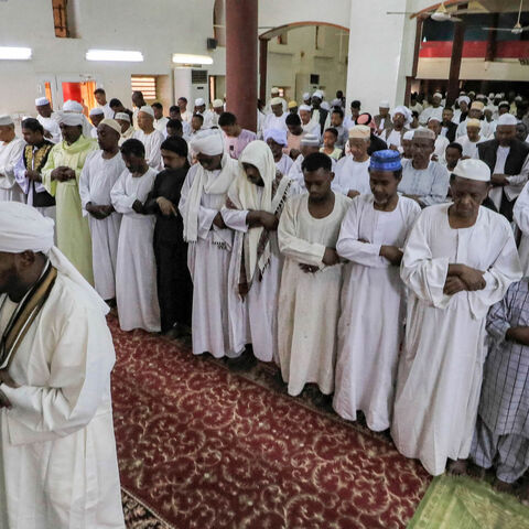 Muslim worshippers pray on the first day of Eid al-Fitr, which marks the end of the holy fasting month of Ramadan, at al-Hara al-Rabaa Mosque in the Juraif Gharb neighborhood, Khartoum, Sudan, April 21, 2023.