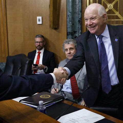WASHINGTON, DC - APRIL 19: Internal Revenue Service Commissioner Daniel Werfel (L) greets Senate Finance Committee members Sen. Ben Cardin (D-MD) (R) and Sen. Sherrod Brown (D-OH) before a hearing about the Biden Administration's proposed budget request for FY2024 and the 2023 tax filing season in the Dirksen Senate Office Building on Capitol Hill on April 19, 2023 in Washington, DC. Confirmed by the Senate in March of this year, Werfel is tasked with overseeing the IRS's $80 billion overhaul to modernize i