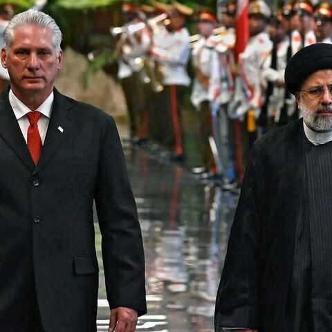 President Miguel Diaz-Canel of Cuba, left, and President Ebrahim Raisi of Iran reviewing the honor guard during a welcoming ceremony in Havana on June 15, 2023.