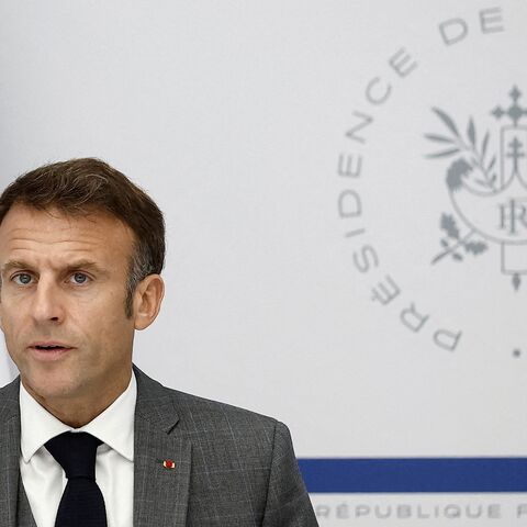 French President Emmanuel Macron attends a video conference at the presidential Elysee Palace on Oct. 20, 2023.
