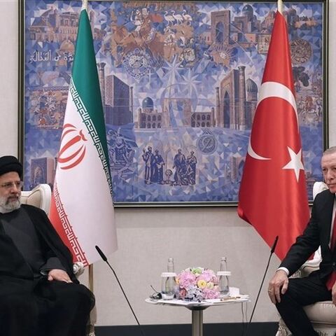 President Recep Tayyip Erdoğan shakes hands with Iranian President Ebrahim Raisi during a meeting in Samarkand, Uzbekistan, Sept. 17, 2022. 