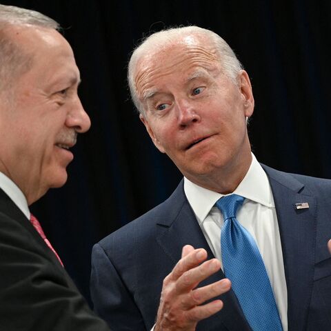 TOPSHOT - Turkey's President Recep Tayyip Erdogan speaks with US President Joe Biden at the start of the first plenary session of the NATO summit at the Ifema congress centre in Madrid, on June 29, 2022. (Photo by GABRIEL BOUYS / AFP) (Photo by GABRIEL BOUYS/AFP via Getty Images)