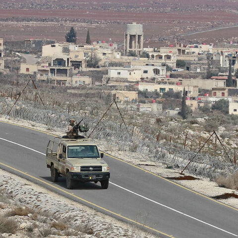 A picture taken during a tour organized by the Jordanian army shows soldiers patrolling along the border with Syria to prevent drug trafficking, Feb. 17, 2022.