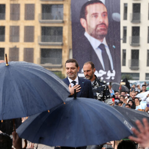 Former Lebanese prime minister Saad Hariri greets his supporters after he prayed at the grave of his father, slain prime minister Rafic Hariri, during a commemoration for the 19th anniversary of his assassination, in Beirut, on February 14, 2024. (Photo by ANWAR AMRO / AFP) (Photo by ANWAR AMRO/AFP via Getty Images)