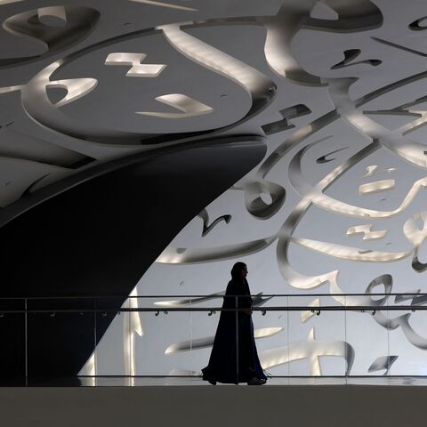 Women walks through the Museum of the Future in Dubai during the Artificial Intelligence Forum held on October 11, 2023. (Photo by Karim SAHIB / AFP) (Photo by KARIM SAHIB/AFP via Getty Images)