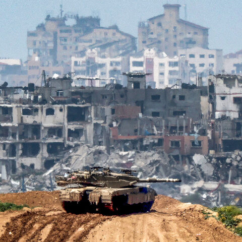 This picture taken from Israel's southern border with the Gaza Strip shows Israeli army battle tank at a position along the border with the Palestinian territory, amid the ongoing conflict between Israel and Hamas, March 19, 2024.