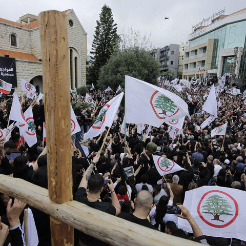 Supporters of the Lebanese Forces (LF) attend the funeral of Pascal Sleiman, a coordinator in the Byblos (Jbeil) area north of Beirut for the LF, in the northern city of Byblos on April 12, 2024. Sleiman was killed on April 8 in what the Lebanese army said was a carjacking by Syrian gang members, who took his body to Syria. (Photo by Ibrahim CHALHOUB / AFP) (Photo by IBRAHIM CHALHOUB/AFP via Getty Images)