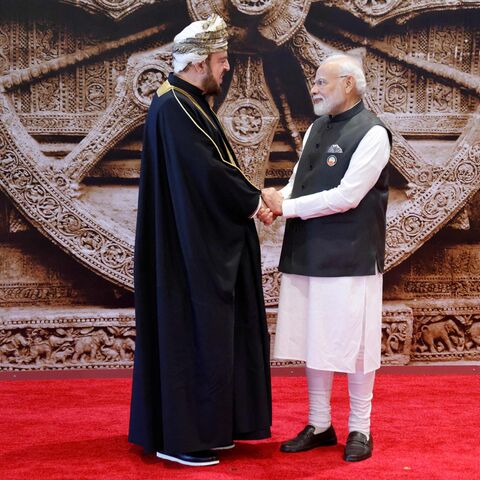 India's Prime Minister Narendra Modi (R) shakes hand with Deputy Prime Minister of Oman Sayyid Asaad ahead of the G20 Leaders' Summit in New Delhi on September 9, 2023. (Photo by Ludovic MARIN / POOL / AFP) (Photo by LUDOVIC MARIN/POOL/AFP via Getty Images)