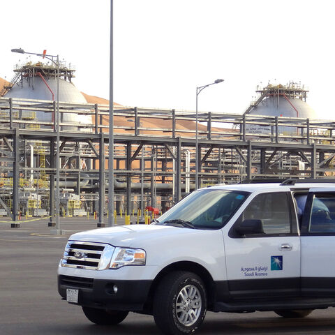 A Saudi Aramco car with visiting journalists is seen outside the company's Natural Gas Liquids plant in Saudi Arabia's remote Empty Quarter near the United Arab Emirates, on May 10, 2016. Despite collapsed global oil prices, production is expanding at Shaybah, as it is in other units of the company at the centre of the kingdom's Vision 2030 drive for diversification away from oil. The Saudi government plans to sell less than five percent of the company in what officials say will be the world's largest-ever 