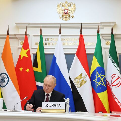 This pool photograph distributed by Russian state agency Sputnik shows Russia's President Vladimir Putin attending a virtual summit of the BRICS group of nations (the bloc that includes Brazil, Russia, India, China and South Africa) to discuss the Israel-Hamas war, in Moscow on November 21, 2023. (Photo by Alexander KAZAKOV / POOL / AFP) (Photo by ALEXANDER KAZAKOV/POOL/AFP via Getty Images)