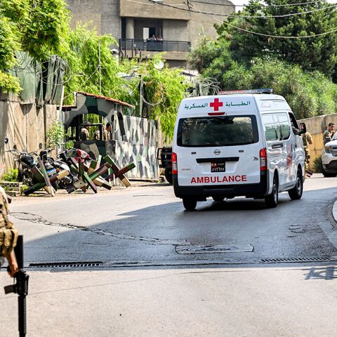 An ambulance is pictured as Lebanese army deploy near the US embassy in Beirut on June 5, 2024, after a Syrian man was arrested following a shooting near the embassy.