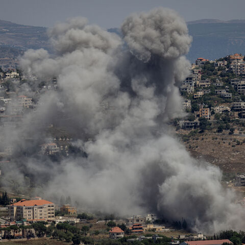 Smoke rises from an Israeli strike against a Hezbollah target on June 25, 2024 in Khiam, Lebanon. Hezbollah and the Israeli Defense Forces (IDF) have been trading cross-border fire since the October 7 attacks, with the conflict escalating in May when the group launched a missile-carrying drone against Israel for the first time. The conflict intensified in June when Hezbollah fired hundreds of rockets and drones at Israeli military sites following the killing of senior commander Taleb Abdullah. This marked t
