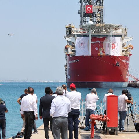 Media film and photograph the Abdulhamid Han drill ship, the fourth built by Turkey, in Mersin on August 9, 2022 before it leaves for gas exploration to an undisputed area in the Mediterranean Sea, in south of the city of Gazipasa. - Turkey on August 9, 2022 sent its newest drill ship on the first eastern Mediterranean energy exploration mission in nearly two years. The search for natural gas in energy-rich waters around the divided island of Cyprus has turned into an irritant in Turkey's ties with the Euro