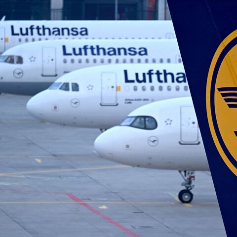 The logo of German airline Lufthansa can be seen on the vertical stabilizer of a plane standing with other Lufthansa aircrafts at the airport in Frankfurt am Main, western Germany, on March 7, 2024. 