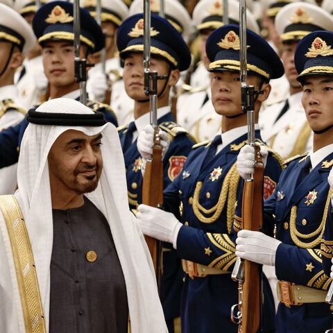 United Arab Emirates President Sheikh Mohammed bin Zayed Al Nahyan reviews the honour guard.