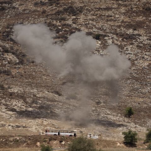 Smoke rises after a strike near a military base in northern Israel by a rocket fired by Hezbollah, July 4, 2024. 
