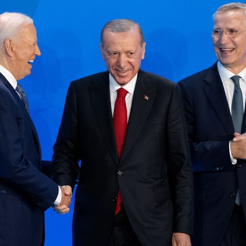 President Joe Biden and NATO Secretary General Jens Stoltenberg greet Turkish President Recep Tayyip Erdogan on stage before a group photo during the 2024 NATO summit on July 10, 2024, in Washington, DC. 