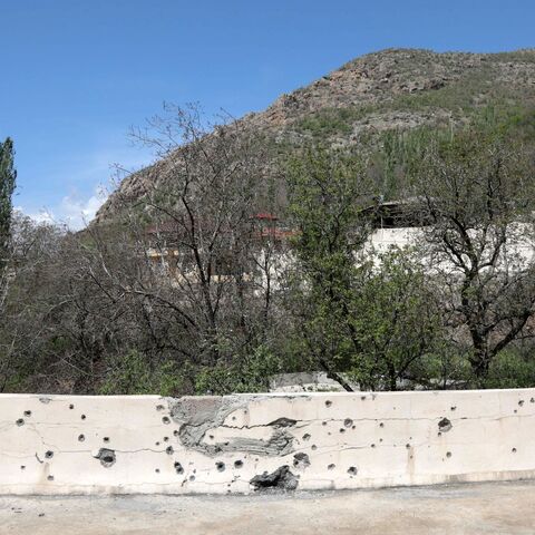 This picture taken on April 25, 2023, shows a shrapnel-pocked walled in the village of Hiror near the Turkish border in northern Iraq's autonomous Kurdish region.