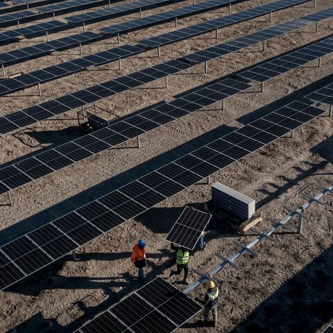 Employees install new solar panels at the Kalyon Energy's Karapinar Solar Power Plant, Karapinar, Turkey, December 2, 2021.