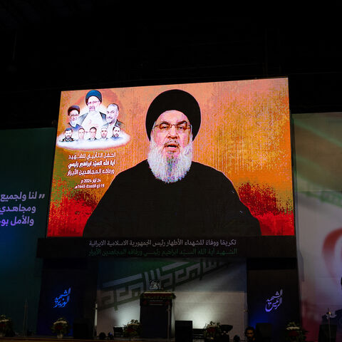 Hezbollah Secretary General Hassan Nasrallah give a televised speech in a hanger in the Beirut suburb of Dahiyeh in Lebanon on May 24, 2024, following the death of President Ebrahim Raisi of Iran in a helicopter crash. 