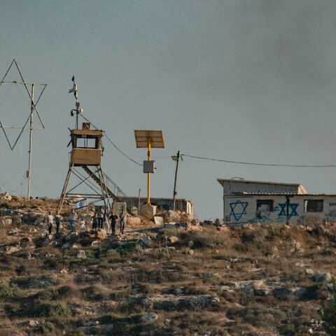 An Israeli check point in the region at the scene as in the presence of armed Israeli forces, settlers attack the industrial area of the town of Beita and set fire to some Palestinian properties in the West Bank on August 2, 2024. 