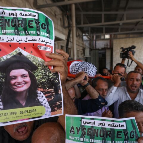 Palestinians carry the body of slain Turkish-American Aysenur Ezgi Eygi, an  International Solidarity Movement activist, during a funeral procession in Nablus in the occupied West Bank on Sept. 9, 2024.