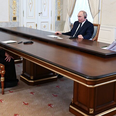 Russia's President Vladimir Putin, accompanied by the country's Security Council Secretary Sergei Shoigu, meets with Ali Akbar Ahmadian, secretary of Iran's Supreme National Security Council, in Saint Petersburg, on Sept. 12, 2024.