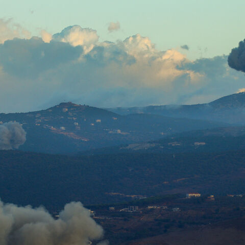 Smoke billows from the site of Israeli airstrikes in Aramti, near the Lebanon-Israel border, on Sept. 23, 2024.  