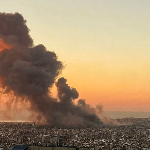 Smoke rises above Beirut's southern suburbs during an Israeli strike on September 27, 2024. Israeli bombing of Iran-backed Hezbollah strongholds around Lebanon has killed hundreds of people this week, while the militant group has retaliated with rocket barrages. (Photo by AFP) (Photo by -/AFP via Getty Images)