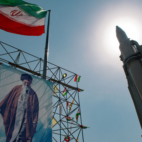 A big banner depicting Iran's Supreme Leader Ayatollah Ali Khamenei is placed next to a ballistic missile in Baharestan Square in Tehran, Iran, on Sept. 26, 2024 on the sideline of an exhibition which marks the 44th anniversary of the start of Iran-Iraq war.