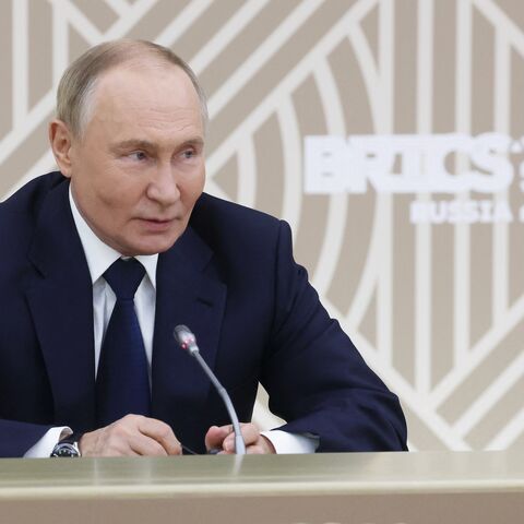 Russia's President Vladimir Putin meets with the heads of leading media outlets from the BRICS member countries in the Moscow region, on Oct. 18, 2024. 