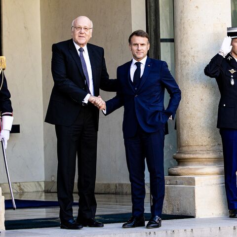 France s President Emmanuel Macron receives Lebanon's Prime Minister Najib Mikati before their bilateral meeting at the Elysee Palace in Paris, France, on Oct. 23, 2024.