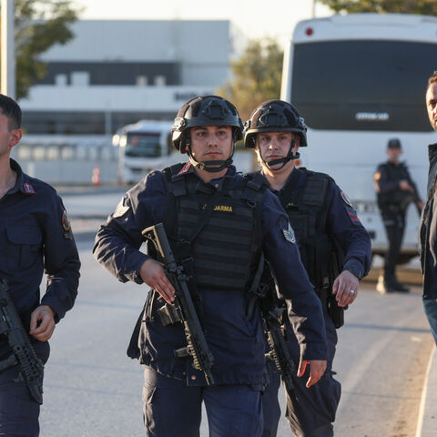 ANKARA, TURKEY - OCTOBER 23: Turkish Jandarma stand guard at the entrance to the Turkish Aerospace Industries facility following an attack on October 23, 2024 in Ankara, Turkey. An attack occurred at the Turkish Aerospace Industries facility in Ankara, with preliminary reports suggesting two attackers detonated an explosive device and opened fire at the entrance gate of the facility. (Photo by Serdar Ozsoy/Getty Images)