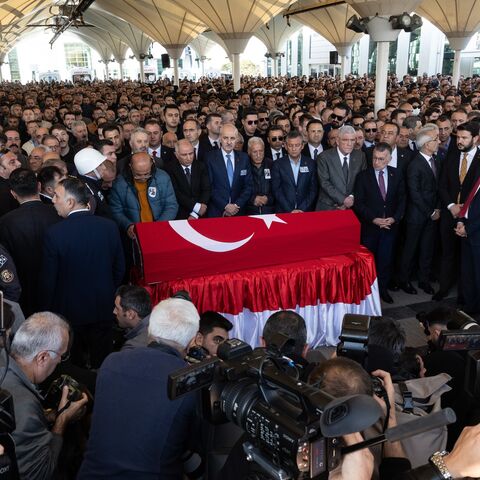 People and politicians attend the funeral of the victims of the October 23, 2024, attack at a Turkish defense company, TUSAS, in Ankara, Oct. 24, 2024.