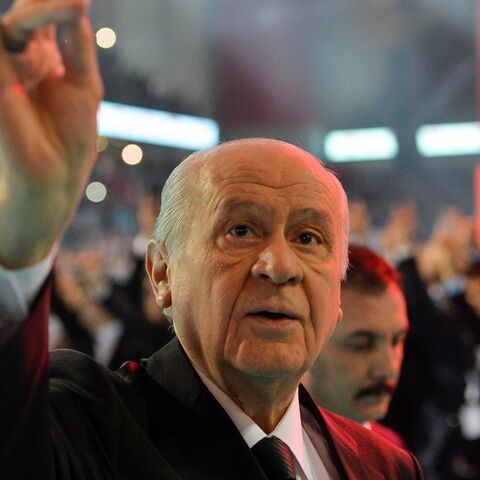 Turkey's right-wing Nationalist Movement Party leader Devlet Bahceli greets the crowd during the party's 12th Ordinary Grand Congress in Ankara, on March 18, 2018.