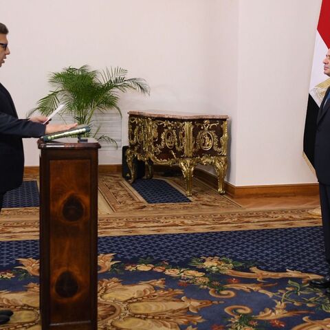 Egypt's new intelligence chief, Maj. Gen. Hassan Mahmoud Rashad (L), is sworn in in front of Egypt's president, Abdel Fattah al-Sisi (R), in Cairo on Oct. 16, 2024.