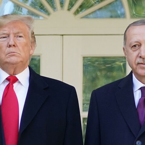 US President Donald Trump greets Turkey's President Recep Tayyip Erdogan(L) upon arrival outside the White House in Washington, on Nov. 13, 2019.