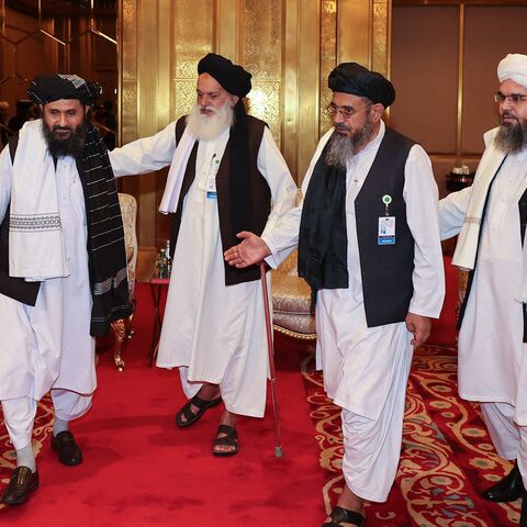 A delgation of Afghanistan's Taliban movement attends a session of the peace talks between the Afghan government and the Taliban in the Qatari capital Doha, on July 17, 2021. (Photo by KARIM JAAFAR / AFP) (Photo by KARIM JAAFAR/AFP via Getty Images)