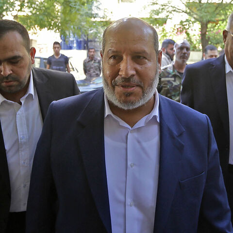 Hamas's chief representative in Lebanon Osama Hamdan (L), Hamas Arab relations chief Khalil al-Hayya (C) and Secretary-General of the Popular Front for the Liberation of Palestine-General Command Talal Naji arrive for a press conference during a visit to Damascus, Syria, Oct. 19, 2022.