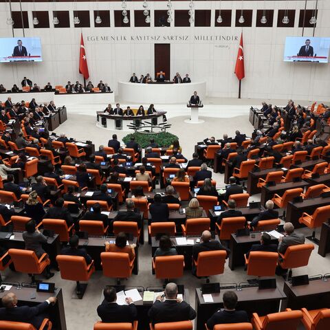 Turkish members of parliament attend a session at the General Assembly of the Turkish Grand National Assembly, in Ankara, on Dec. 11, 2023. 