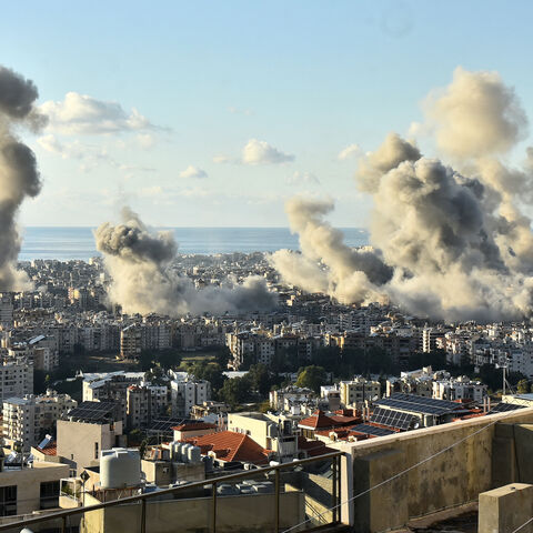 Smoke billows above Beirut's southern suburbs following an Israeli airstrike on Nov. 26, 2024, amid the ongoing war between Israel and Hezbollah. 