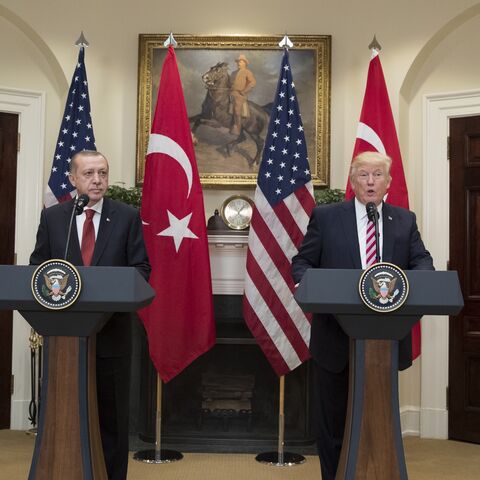 US President Donald Trump (R) and Turkish President Recep Tayyip Erdogan (L) deliver joint statements in the Roosevelt Room of the White House, Washington, DC, May 16, 2017.