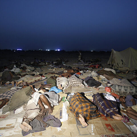 Ethiopian migrants sleep out in the open near a transit centre where they wait to be repatriated, in the western Yemeni town of Haradh, on the border with Saudi Arabia, May 21, 2013. Saudi Arabia's King Abdullah in April ordered a three-month delay to a crackdown on migrant workers which has led to thousands of deportations, to give foreigners in the kingdom a chance to sort out their papers. More than 200,000 foreigners have been deported from the country over the past few months. REUTERS/Khaled Abdullah (
