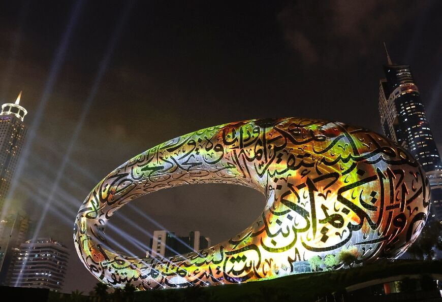 The seven-storey hollow silver ellipse is decorated with Arabic calligraphy quotes from Dubai's ruler