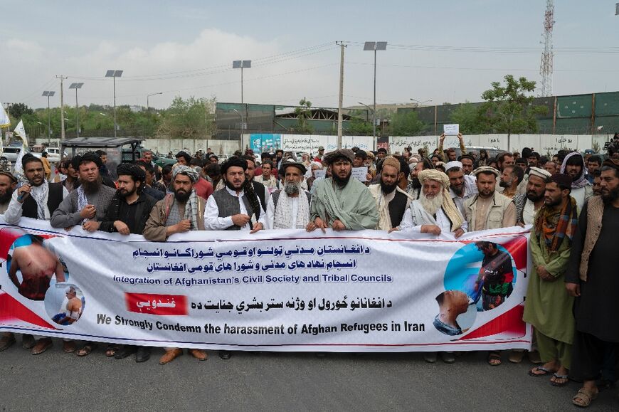 Afghan men protested the videos at Kabul's Ahmad Shah Massoud Square in front of the US embassy in Kabul on April 12, 2022